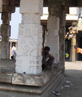 man and pillar